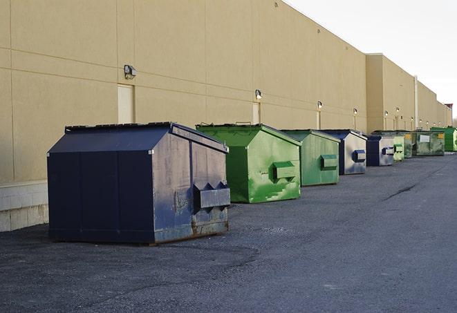 a stack of yellow construction dumpsters on a job site in Lebanon, PA